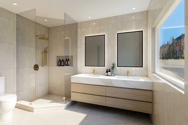 Custom bathroom vanity being crafted with sintered stone countertop, soft-close drawers and integrated LED lighting