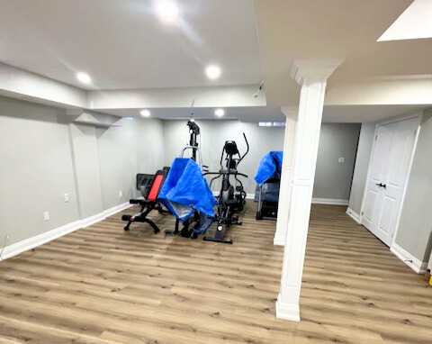 Grey vinyl flooring with built in tv wall, wet bar - Image 2