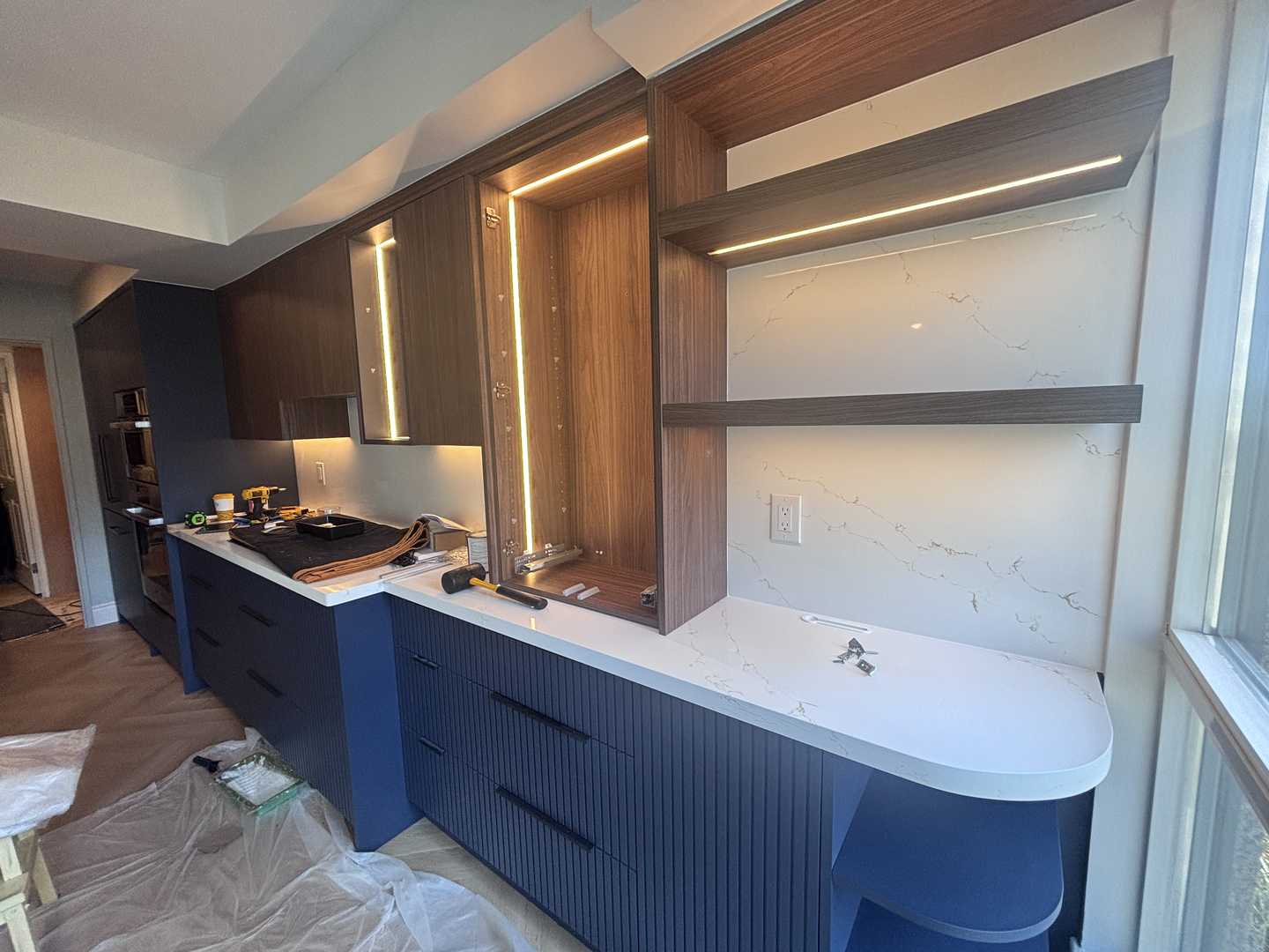 walnut wood panel with navy blue fluted kitchen, herringbone oak - Image 3