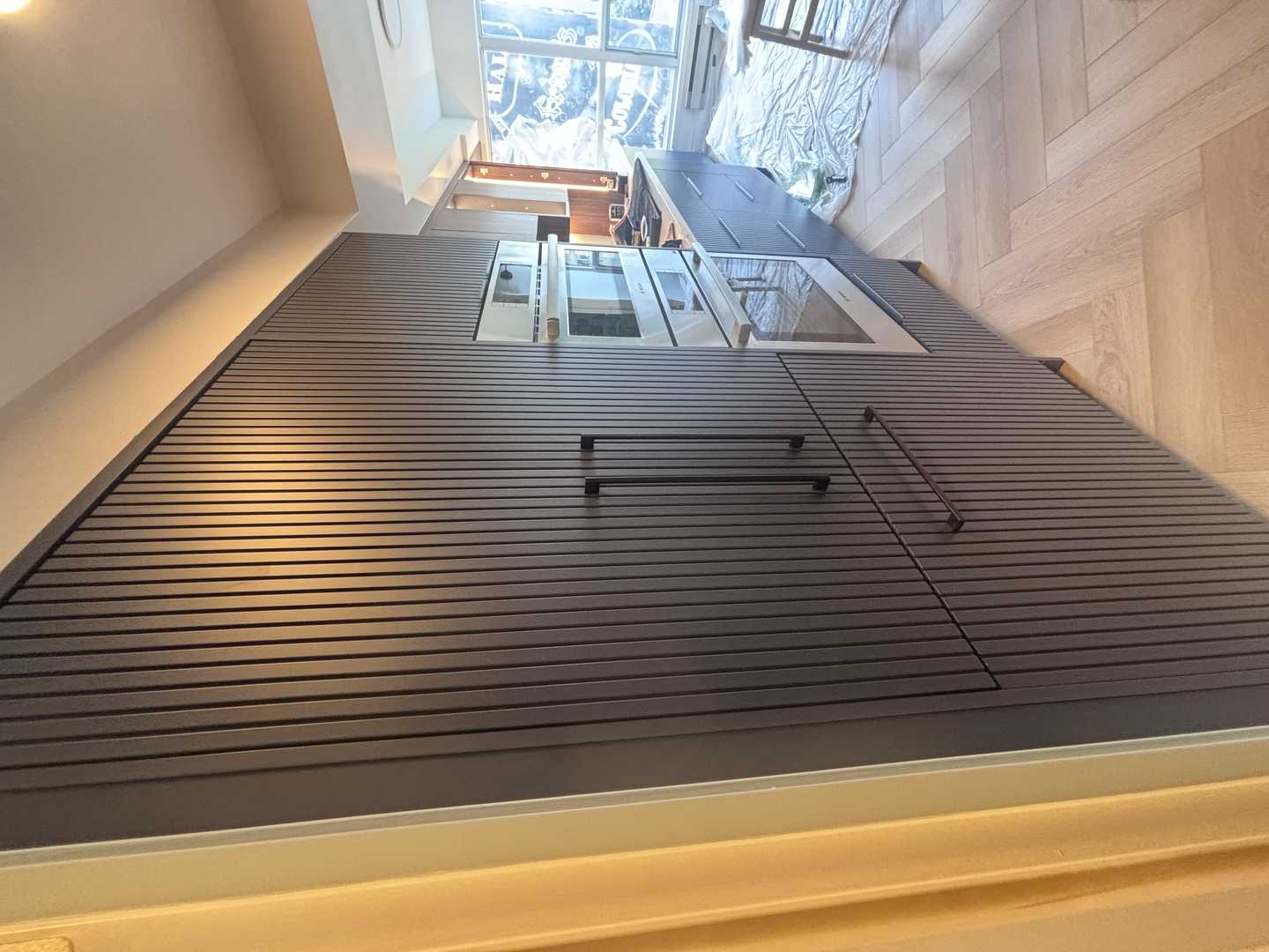 walnut wood panel with navy blue fluted kitchen, herringbone oak - Image 6