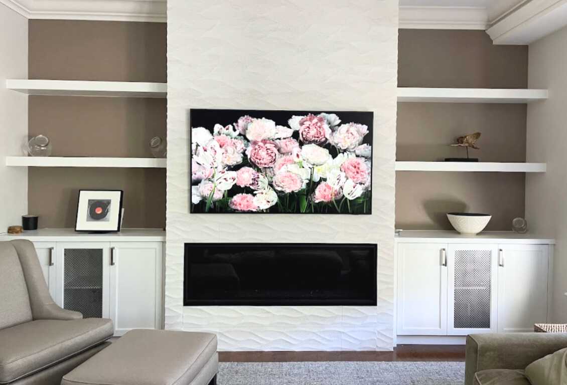 Complete home renovation with a statement wavy-textured fireplace wall. Kitchen - Image 10