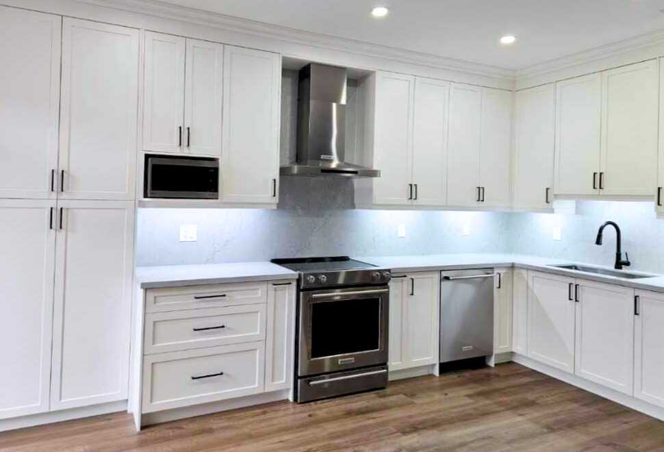 White shaker Built-in customize kitchen cabinets with drawers with brownish - Image 5