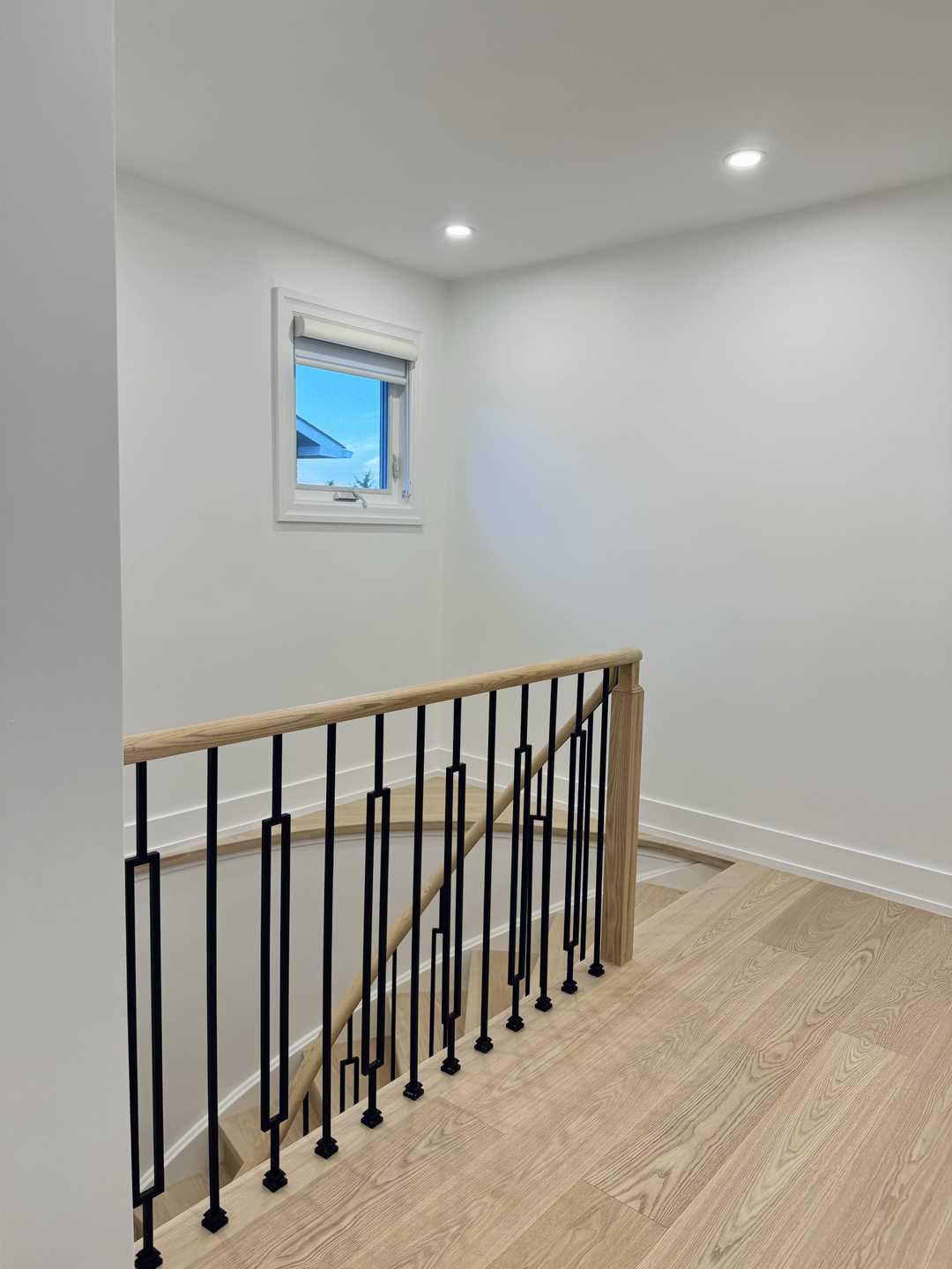 Whole-house floor renovation, including the staircase finished in natural wood