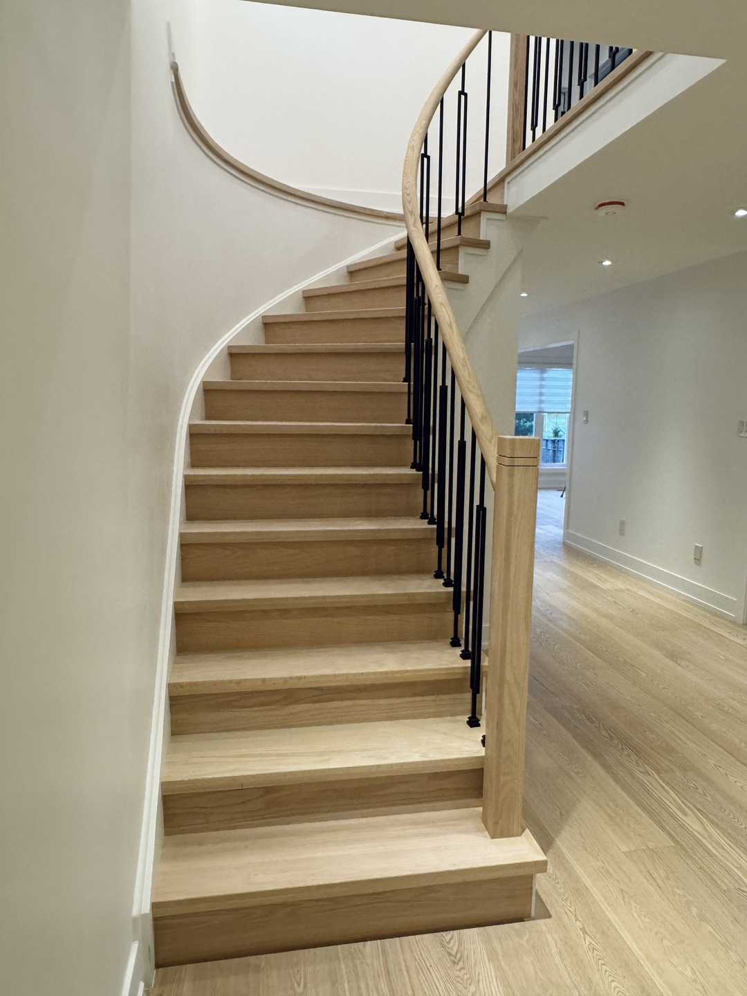 Whole-house floor renovation, including the staircase finished in natural wood - Image 5