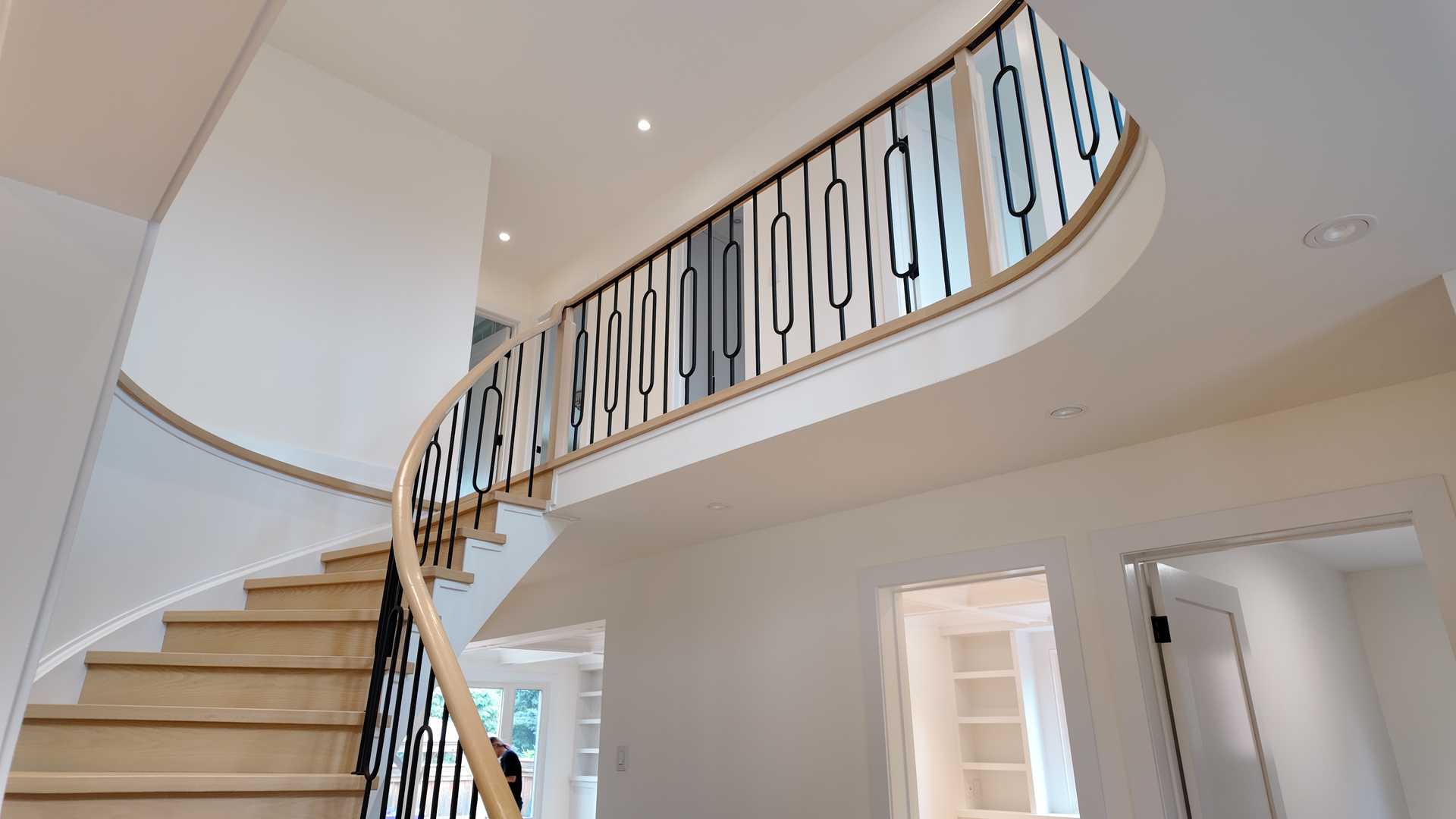 blonde wood flooring， with smooth rounded handrail - Image 7