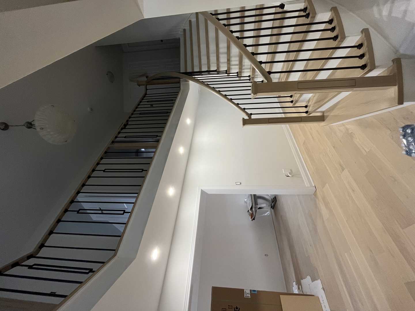 Complete floor renovation throughout the house, including the staircase in